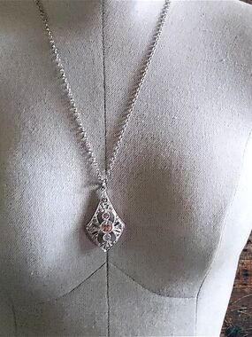 Delicate Silver Filigree Pendant Necklace with Pink Accent